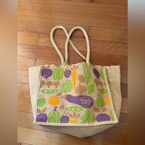 Trader Joe’s large jute Tote bag with vegetable pattern design.